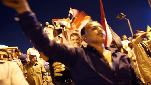 Supporters of ousted president Mohamed Morsi demonstrate in the street earlier this month.